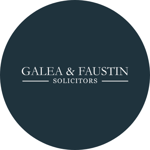 Logo of Galea & Faustin Solicitors in a circular design.